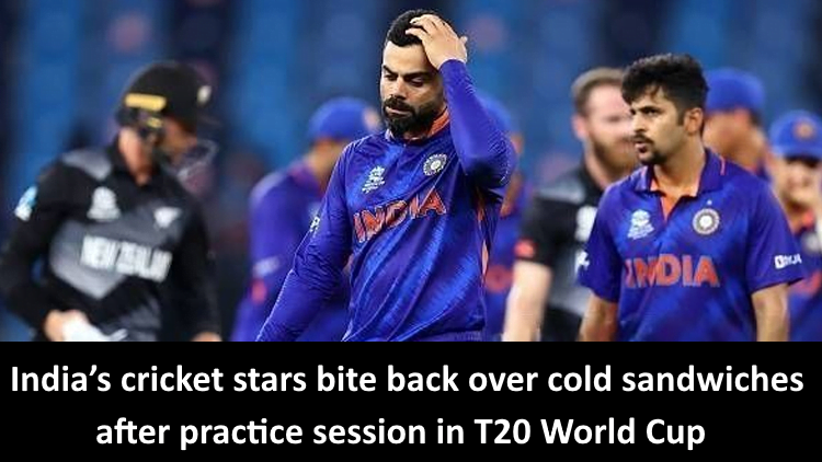 After a T20 World Cup practise session, India's cricket players eat cold sandwiches